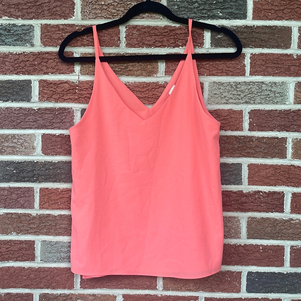 Like New Juniors, salmon colored blouse tank top. Size of a small.